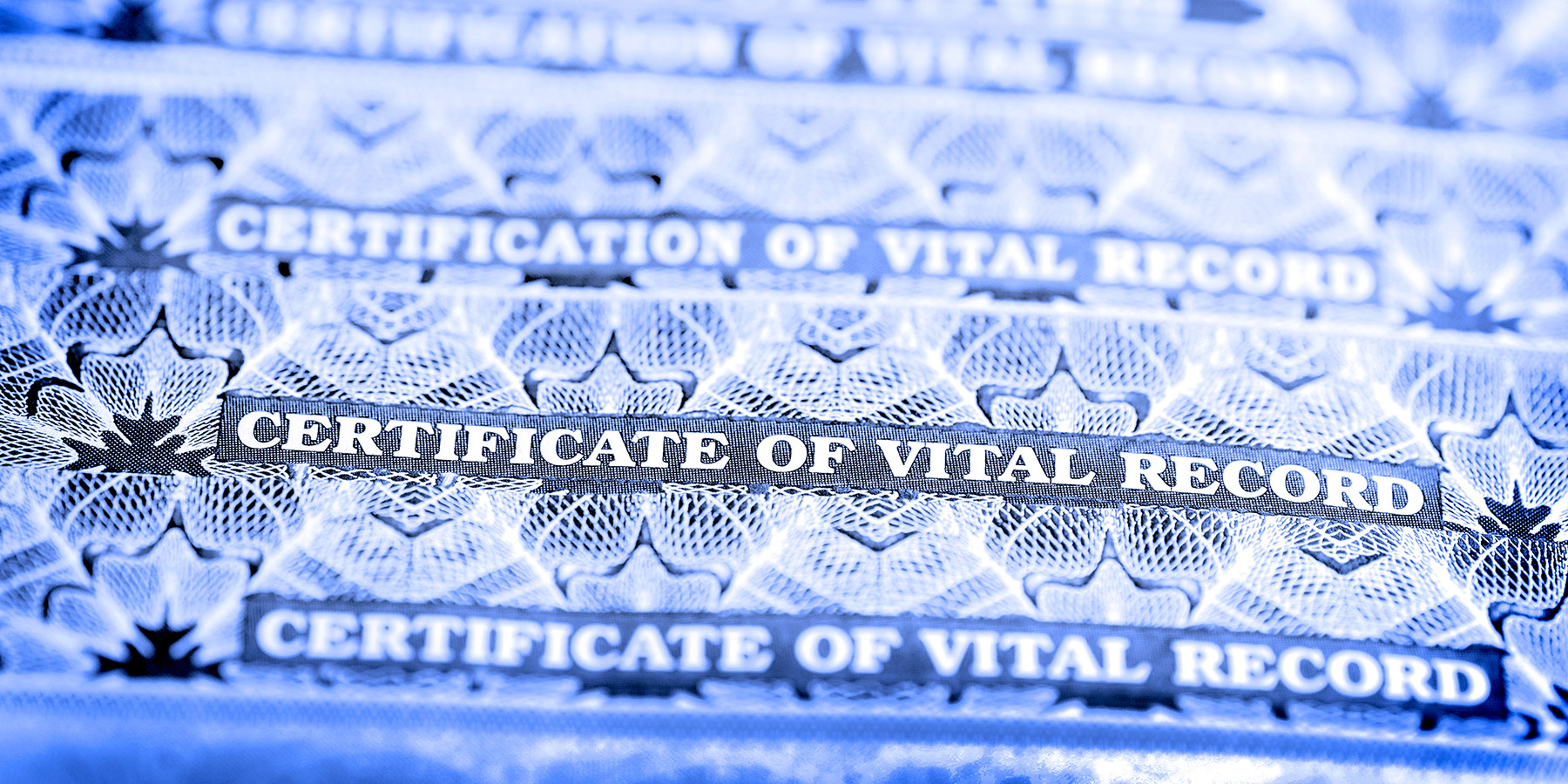 Stack of vital record certificates